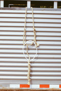 Lariat Noseband Halter with attached lead rope.